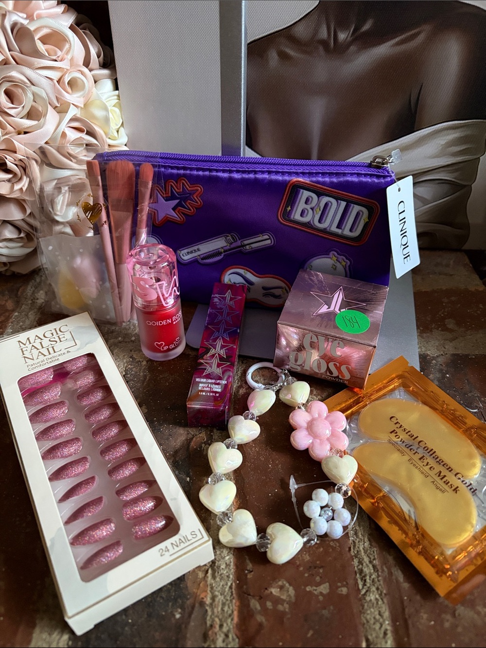 Clinique Purple Cosmetic Pouch with Pink and Gold Beauty Bundle